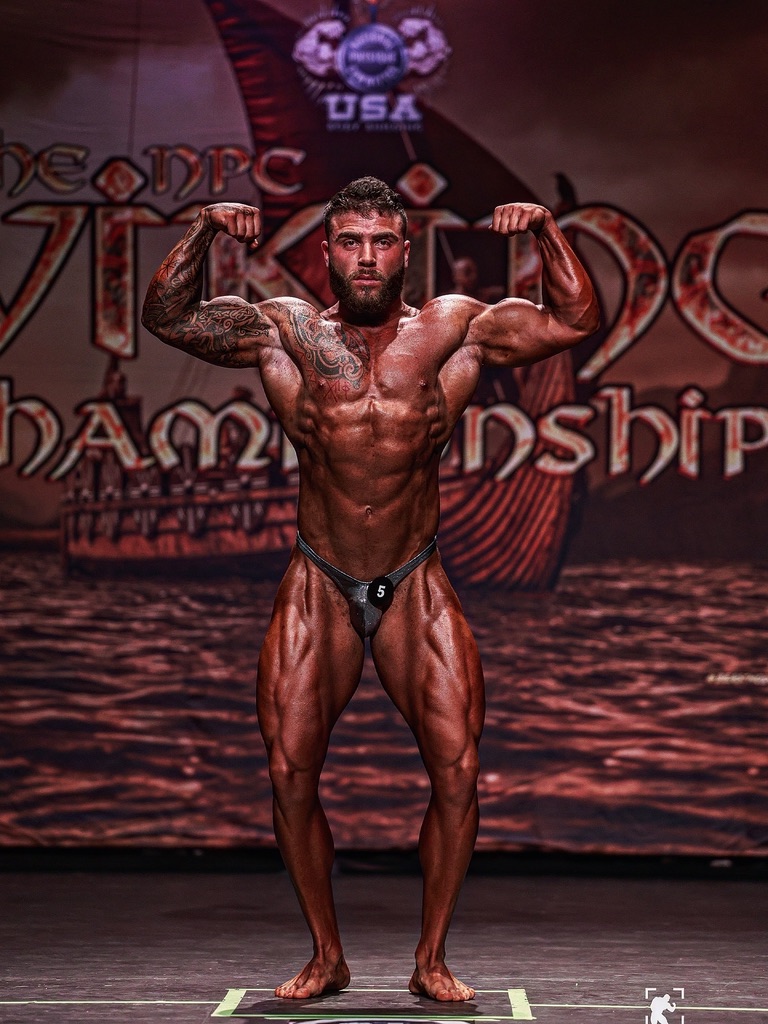 Coach Lloyd on the NPC Viking Championship stage